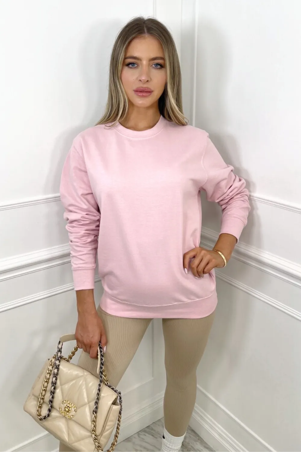 Amber light pink round neck essential sweater