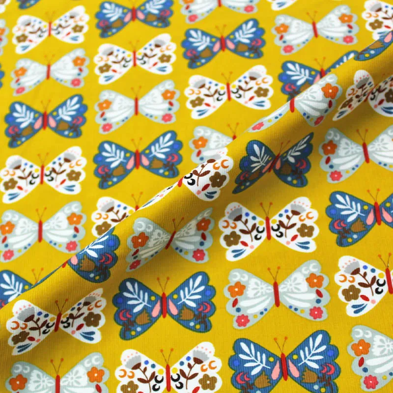 Dressmaking Needlecord - Yellow - Fluttering Butterfly